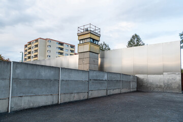 Section of the original Berlin Wall with a watchtower, in Berlin, Germany.
