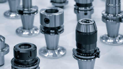 Milling metal cutter tools for CNC machinein blue, dustrial design background, engineering technology concept.