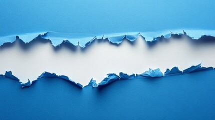 A torn blue paper with a white background showing through.