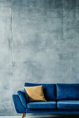 Blue sofa against concrete wall. Scandinavian loft home interior design of modern living room in minimalist studio apartment.Blue sofa against concrete wall. Scandinavian loft home interior design of 