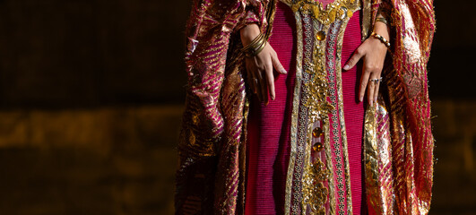 vCloseup of women in egyptian clothes from Aida opera by Giuseppe Verdi