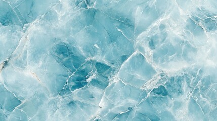 Obraz premium Close-up of a smooth, light blue marble surface with a swirling pattern.