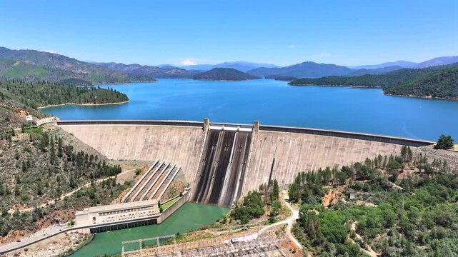 Shasta Dam - Close Aerial Approach of Dam with Full Lake in Summer