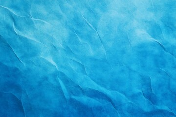 Obraz premium Mottled bright blue paper with minimal texture, perfect for simple background designs