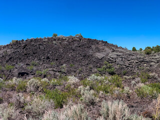 Ancient Volcanic Rock Eroding In Eastern Idaho With Scrub Brush