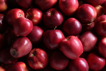 Fresh ripe red apples as background, top view