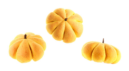 Pumpkin shaped buns in air on white background