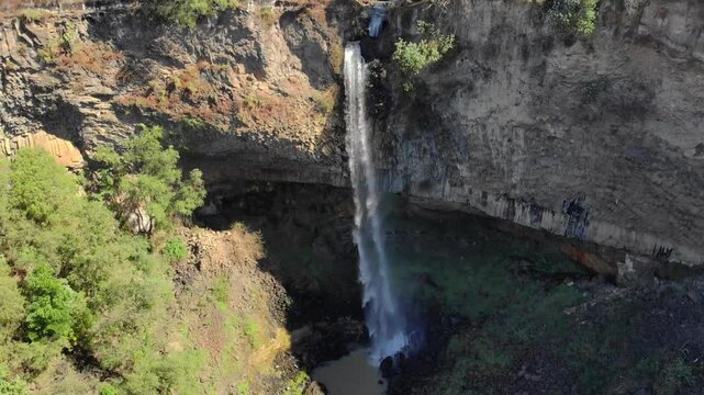 Waterfall in National Park Prismas Basalticos, geometric formations, Pleistocene era, Natural wonder. Hidalgo, Mexico