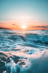 Naklejka premium Sunrise over ocean with gentle waves, creating a serene atmosphere in morning light