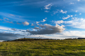 Sunset views over rural farmland with clouds