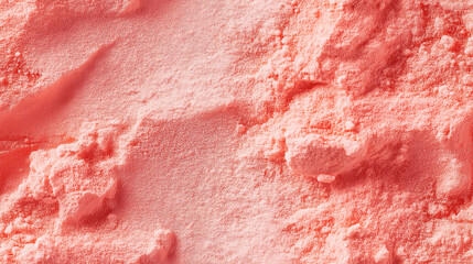 a close-up, top-down view of dried grapefruit powder, showcasing a soft pink-orange hue and fine, smooth texture