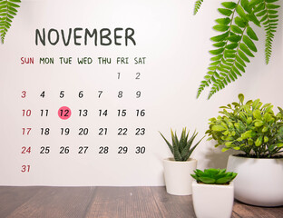 Wooden blocks calendar shows November 12 date