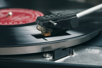 Close-up of a record player needle on a vinyl record