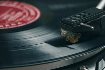Close-up of a record player needle on a vinyl record
