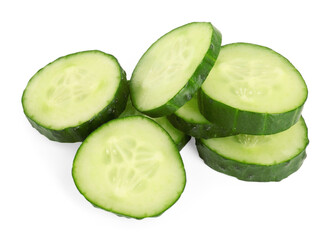 Pile of fresh cut cucumber slices isolated on white