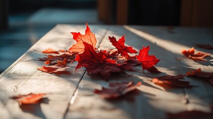 Obraz premium Autumn Maple Leaves on a Wooden Table
