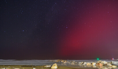 Aurora Borealis and red SAR in the sky of Tuscany on October 11, 2024, San Vincenzo, Livorno, Italy