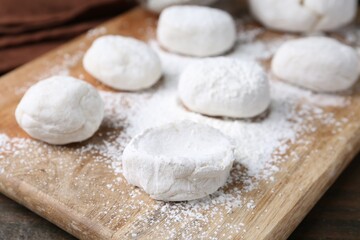 Dough for tasty homemade mochi on wooden table, closeup