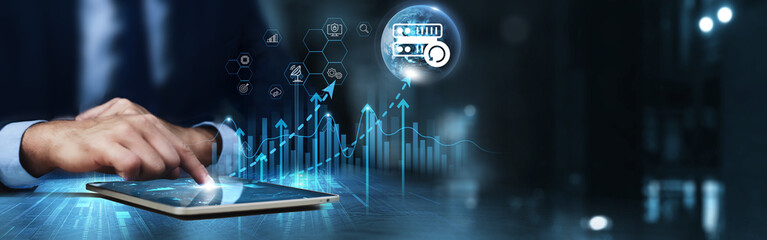 Backup: Businessman using tablet and analyzing technical growth by data recovery, cloud storage,...