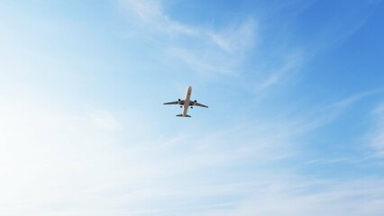 ULTRA HD. Airplane flies in blue sky. Travel. Airplane takes off against the background of blue sky.	