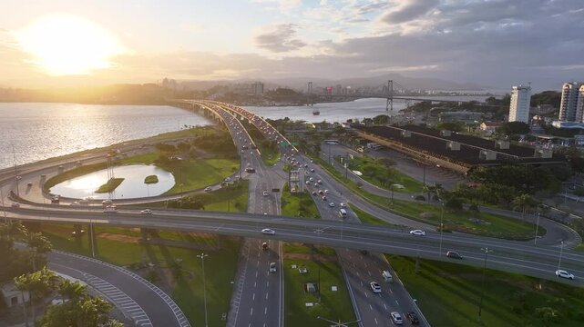 Sunset Skyline At Florianopolis In Santa Catarina Brazil. Colorful Sunset. Traffic Bridge. Freeway Landscape. Sunset Skyline At Florianopolis In Santa Catarina Brazil. Landmark Buildings.