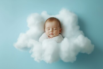 A peaceful baby boy sleeping in a fluffy cloud blanket while floating in a light blue studio background