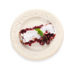 Plate with piece of tasty cherry strudel on white background