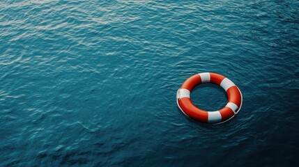 Naklejka premium A life preserver floating on calm blue waters, contrasting red and white against serene blue, representing safety and peace.