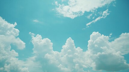 Fototapeta premium Majestic Clouds Adorn the Vibrant Azure Sky