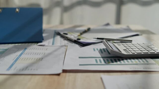 business documents stationery and Office equipment and products on the woking desk table.