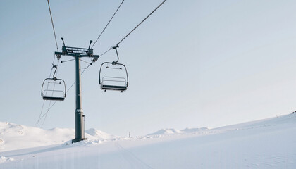 Ski resort chairlift over a snowy landscape