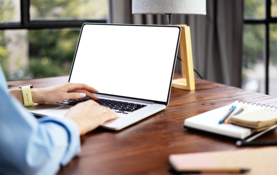 Mockup image of a woman using laptop with blank screen. Transparent. Cut out. PNG