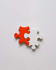 Obraz premium a puzzle piece fitting together on plain white background