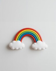 Fototapeta premium a rainbow with clouds on plain white background