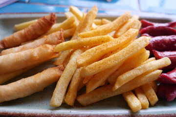 Enjoy a delicious Plate featuring Crispy French Fries alongside a variety of Finger Foods