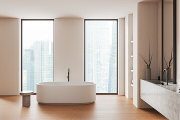 Stylish hotel bathroom interior with sink and bathtub, panoramic window