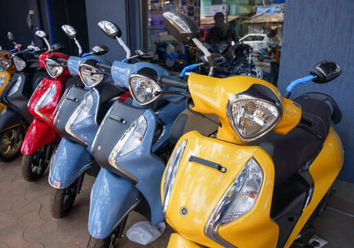 Mapusa, India - February 26, 2024: A range of new Japanese YAMAHA Fascino 125 motorcycles