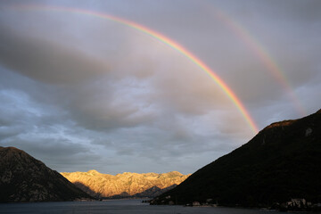 Rainbow during rain in the Bay of Kotor