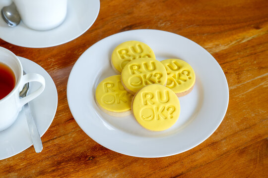  R U OK Day Australia, fundraising morning tea, yellow themed biscuit, mental health depression advocacy, suicide prevention awareness - Powered by Adobe