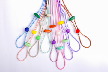 Colorful handmade bracelets with intricate designs displayed on a clean white background. Perfect for showcasing vibrant, artisanal jewelry with a modern, minimalist touch.