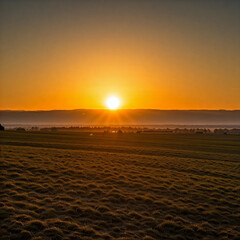 Naklejka premium sunset at the beach. sunset over the field. golden hour photography. sunrise over the mountain land.