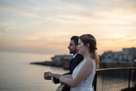 Photos of a newlywed couple on the Spanish coast, Nerja, Malaga.