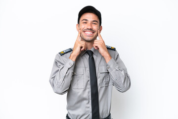 Young safeguard man over isolated white background smiling with a happy and pleasant expression