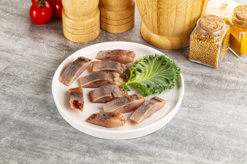 Sliced salted herring fillet snack