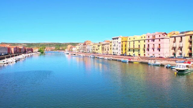 Bosa cityscape in Sardinia, Italy with colorful buildings architecture by Temo river reflection in summer