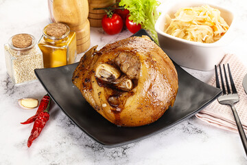 Baked pork knee with spices