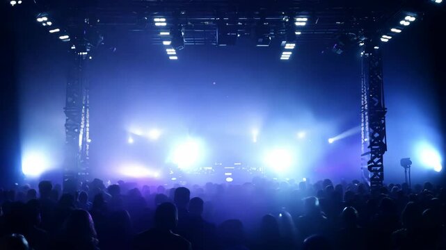 Flashy nightclub scene with lasers, disco lights, and smoke-filled air creating a captivating light show on stage.