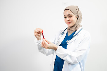 Muslim Arab person. The face of a female doctor on an isolated white background.