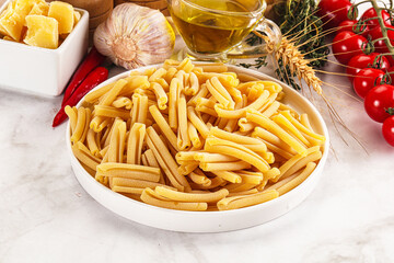 Raw dry Italian pasta - casarecce