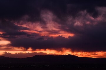 Fototapeta premium Dramatic autumn sunset over the front range of the colorado rocky mountains as seen from broomfield, colorado